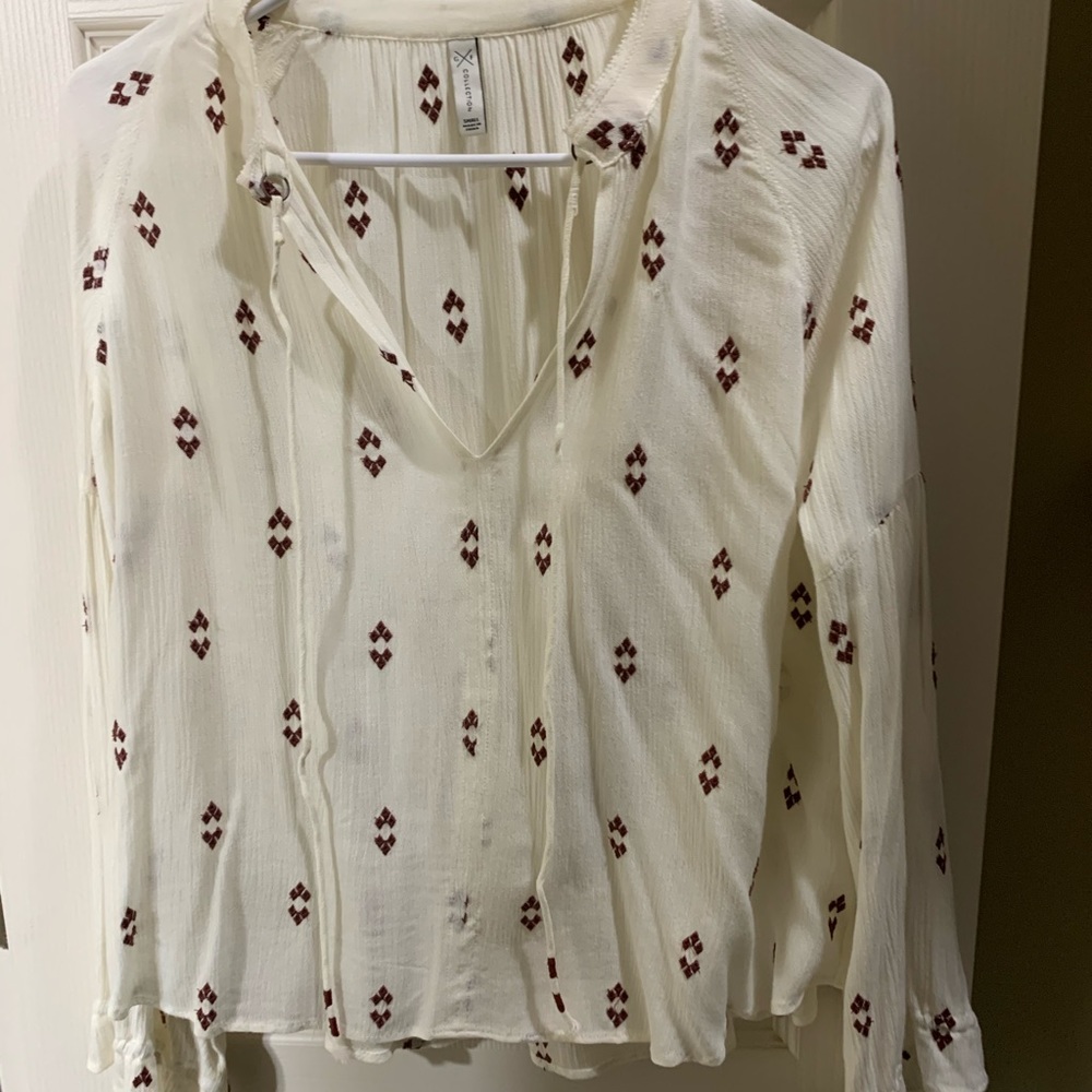 Maroon and white long sleeve top